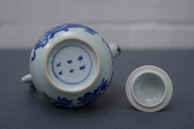 A Chinese blue and white ewer and cover with 'antiquities' design, Kangxi